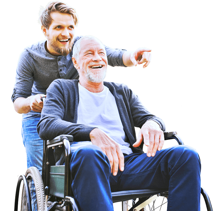 caregiver and senior in wheel chair smiling